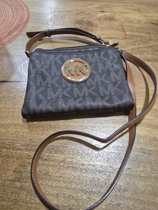 Michael Kors Handbags - Michael Kors Brown Monogram Crossbody with Tan Strap and Gold Logo